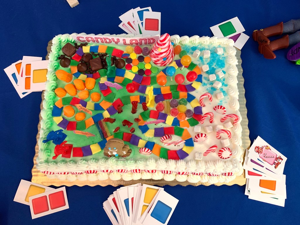 Homemade Candy Land game board cake for Toy Story-themed birthday party