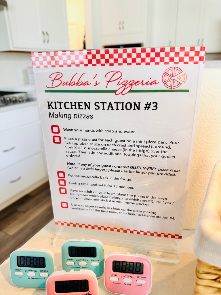 Close-up of Bubba’s Pizzeria Kitchen Station #3 instruction sign with step-by-step pizza making directions.