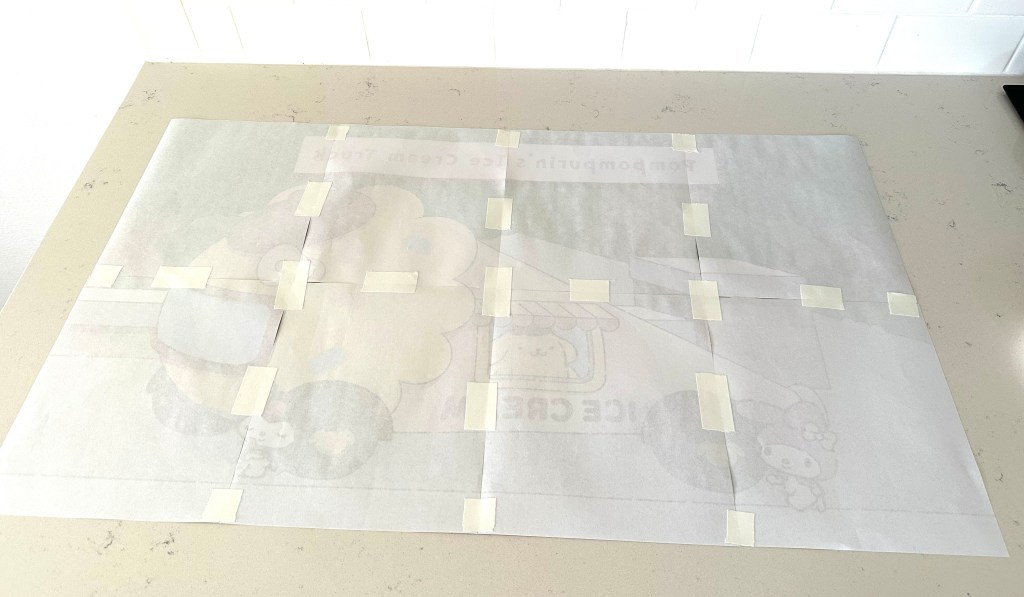 Backside of the taped-together sheets showing how the sections are reinforced with strips of tape to keep the large image stable.