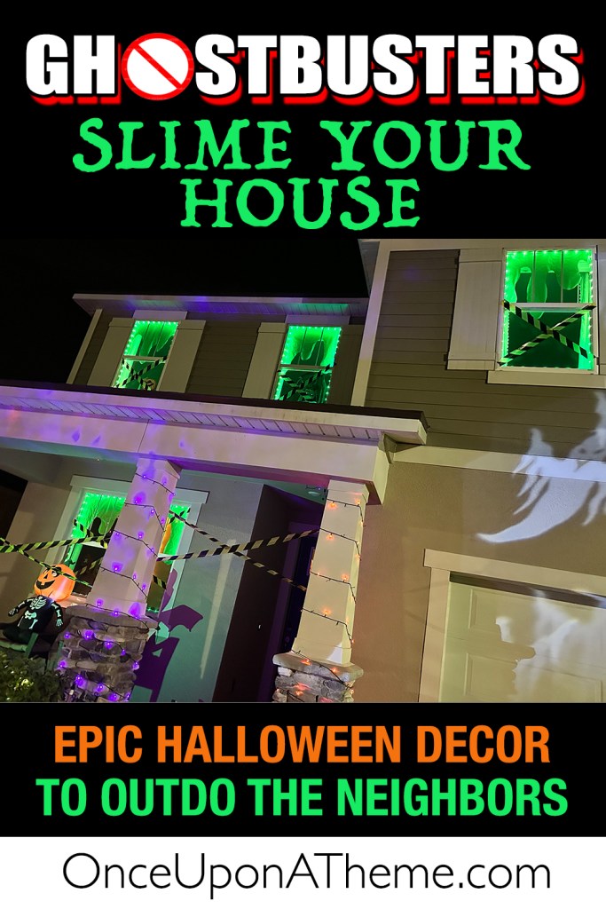 Ghostbusters-themed Halloween house with green window slime lights, caution tape, and ghost projections on the exterior.